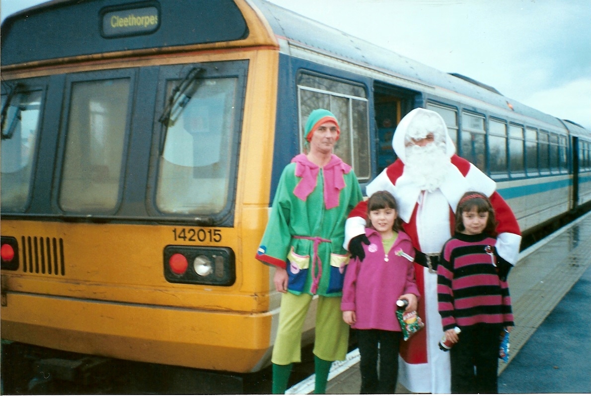 Santa and his elf at Barton station
